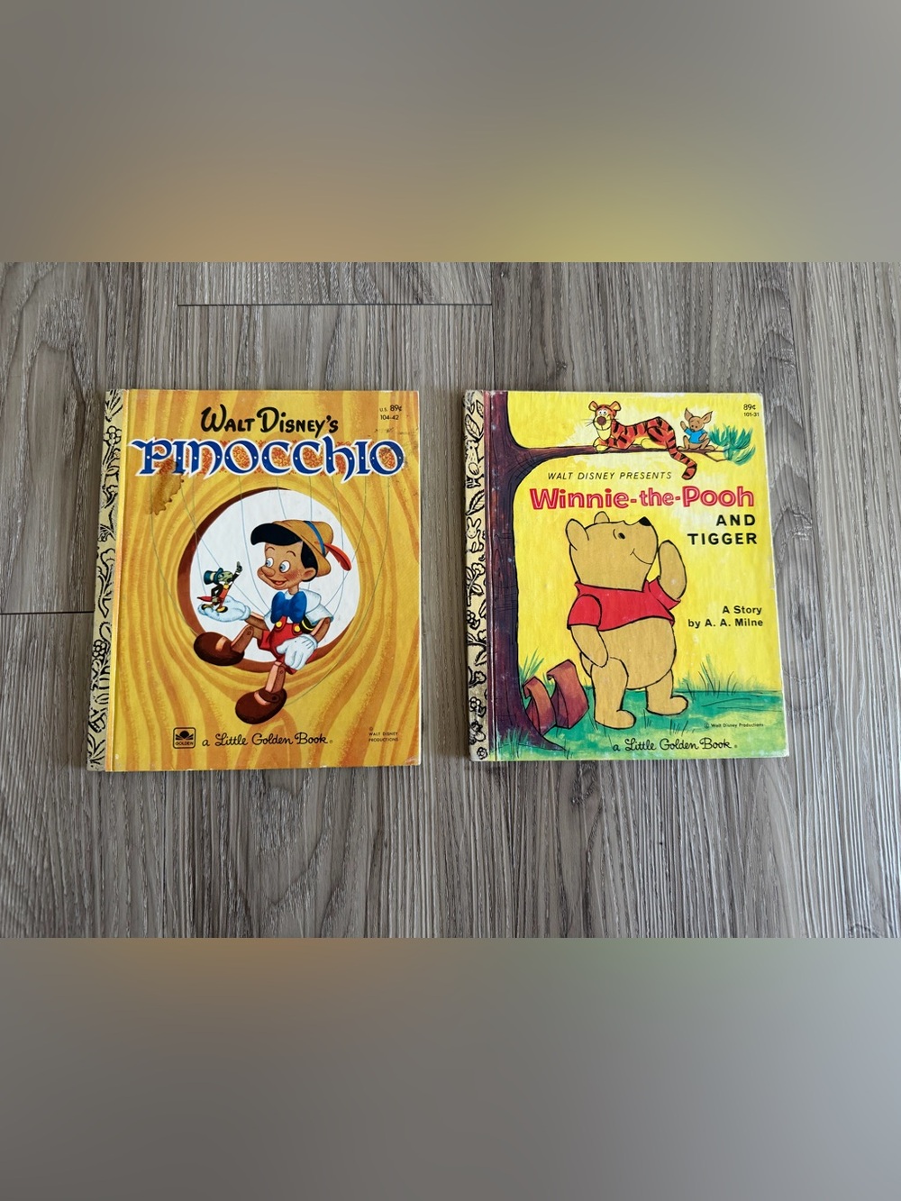 2 vintage Walt Disney's Little Golden Books 
Pinocchio, Winnie-the-Pooh & Tigger
